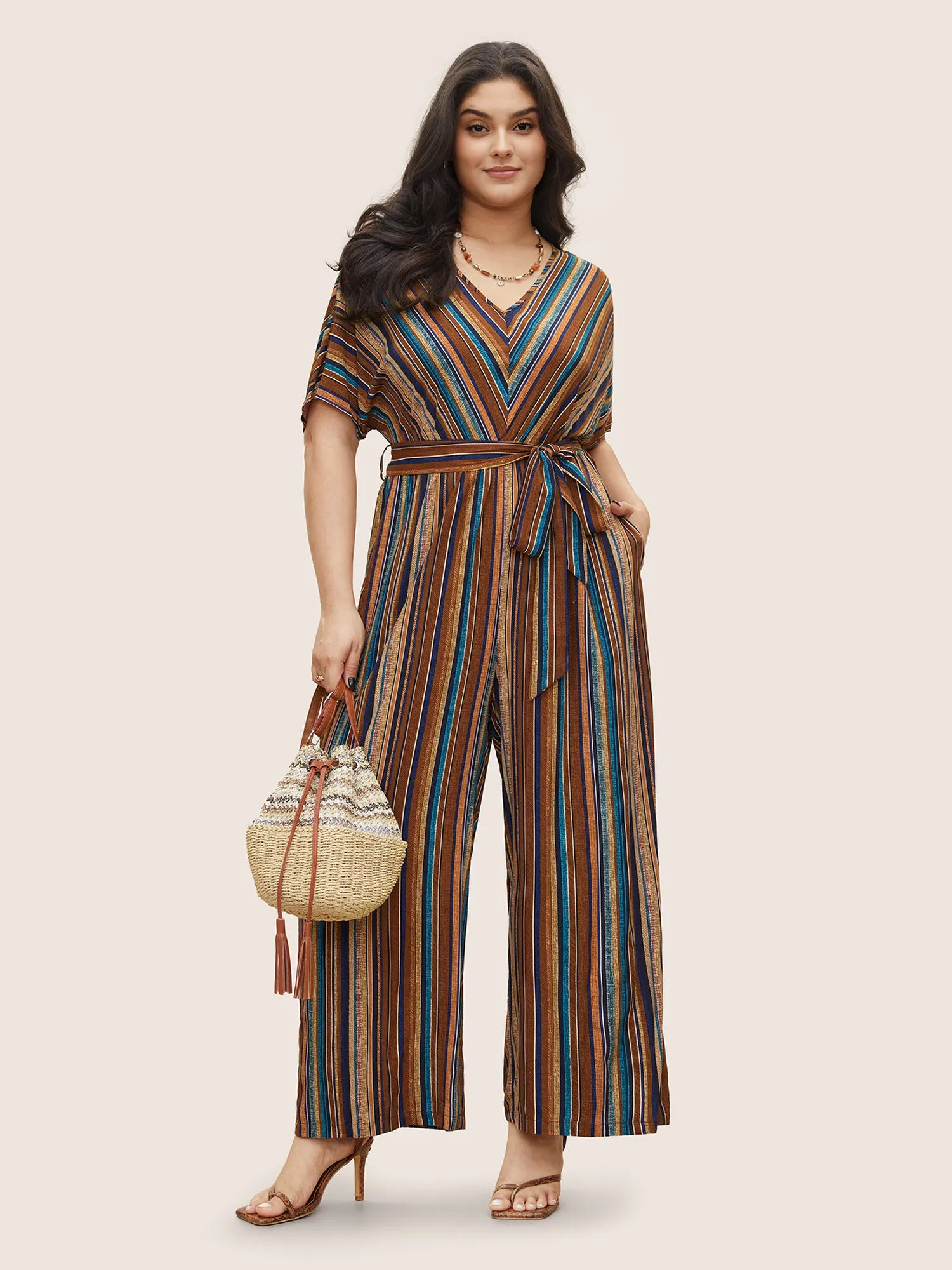 Rayon Contrast Striped Belted Jumpsuit sold by Bloomchic