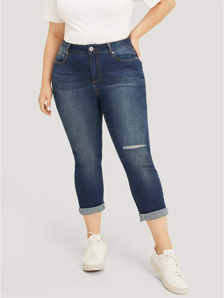 Very Stretchy High Rise Dark Wash Cut Out Jeans sold by Bloomchic