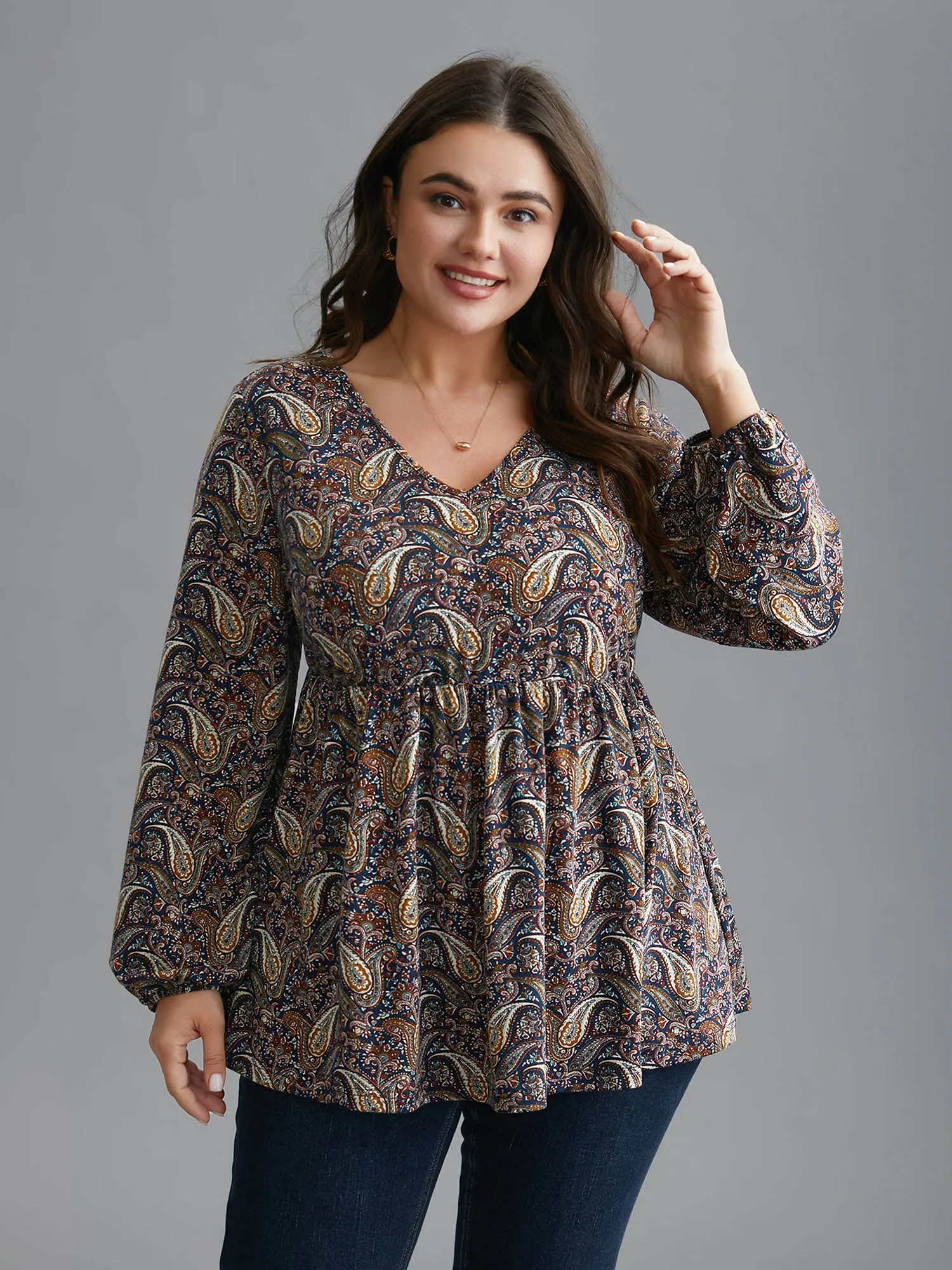 Perris Pattern V-Neck Waist-Cinching Knit Top sold by Bloomchic