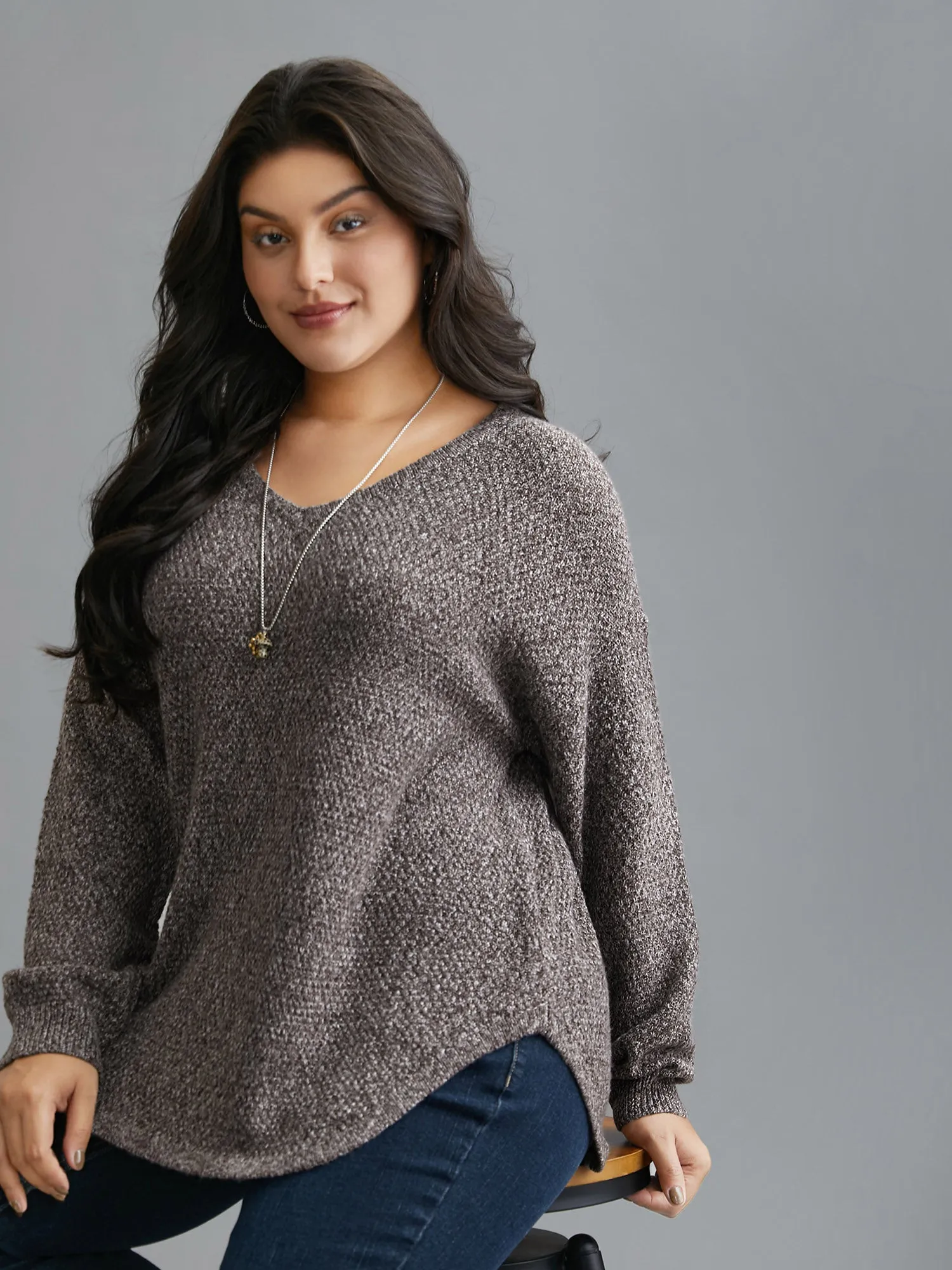Textured V-Neck Curved Hem Pullover sold by Bloomchic