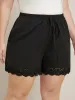 Solid Elastic Waist Ties Up Lace Hem Pocket Shorts sold by Bloomchic