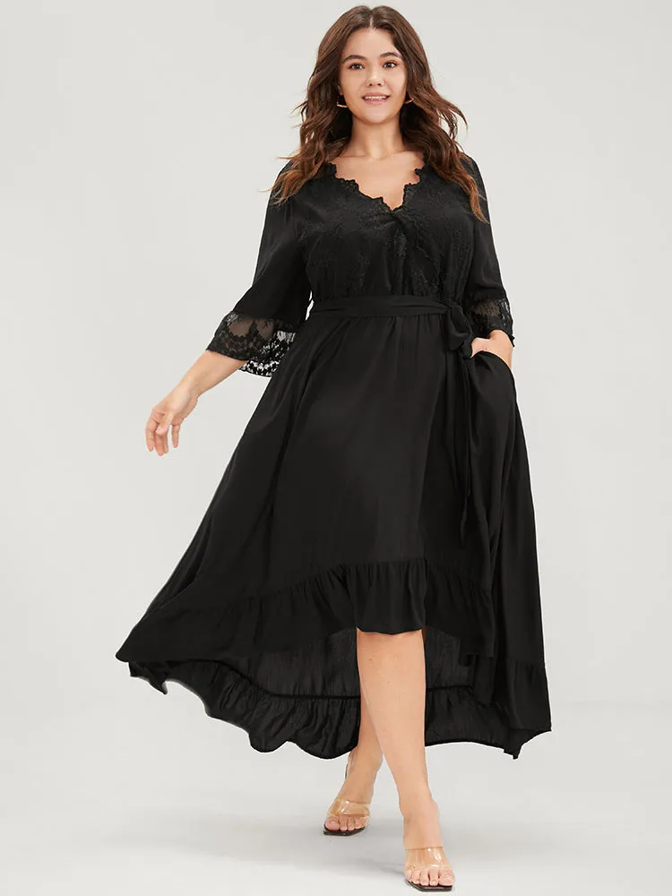Solid Bell Sleeve Pocket Asymmetrical Hem Belted Lace Wrap Dress sold by Bloomchic