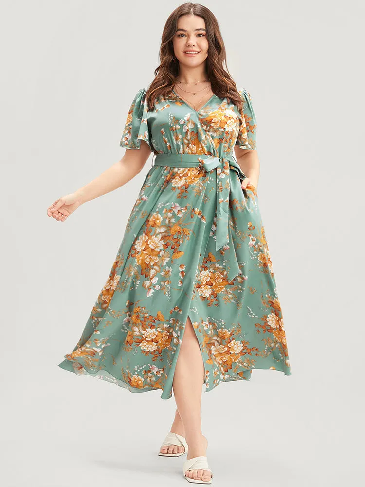Floral Print Surplice Neck Ruffles Pocket Belted Split Hem Dress sold by Bloomchic