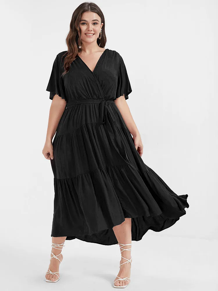 Solid Button Pocket Belted Ruffles Wrap Midi Dress sold by Bloomchic