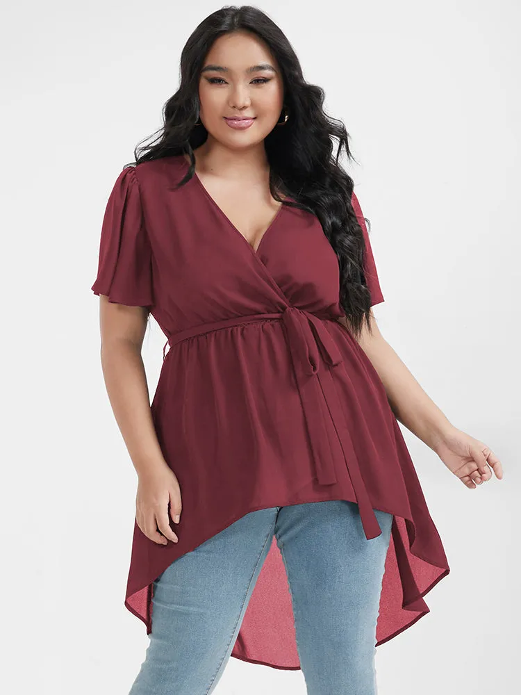 Plain Asymmetrical Hem Ruffles Belted Wrap Blouse sold by Bloomchic