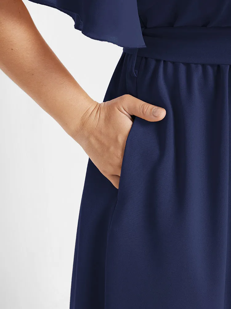 Solid Belted Asymmetrical Hem Flutter Wrap Blouse sold by Bloomchic product image thumbnail 4