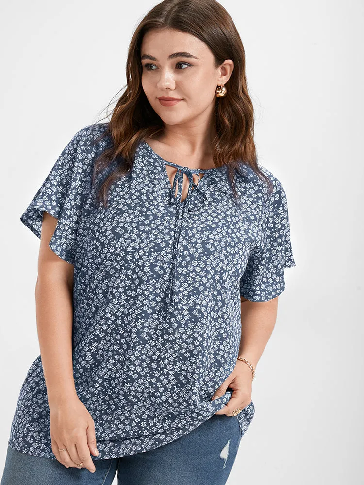 Ditsy Floral Tie Neck Flutter Sleeve Blouse sold by Bloomchic