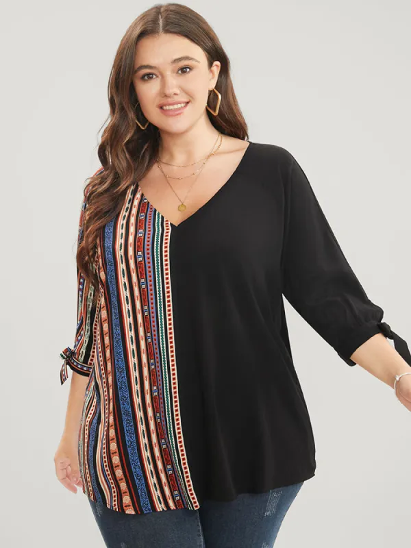 Striped Geometric Patchwork Knotted Sleeve Blouse sold by Bloomchic