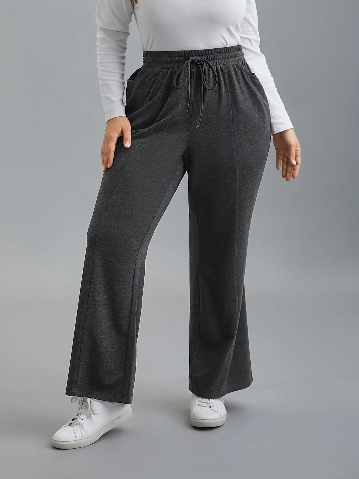 Plain Drawstring Elastic Waist Bootcut Pants sold by Bloomchic