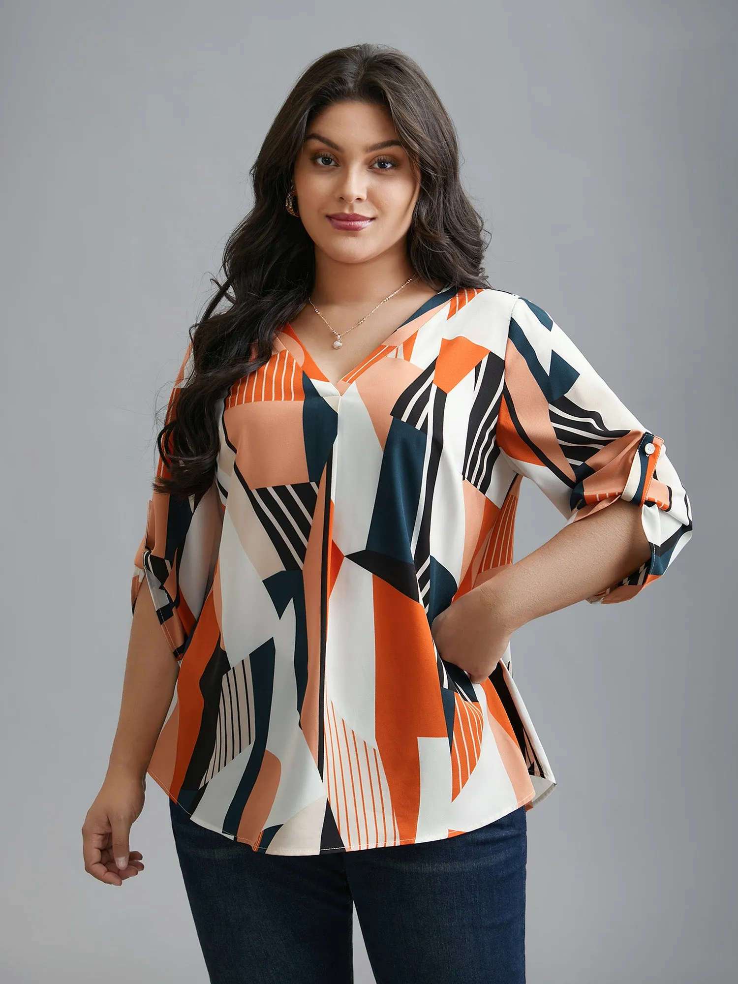 Abstract Print Tab Sleeve Blouse sold by Bloomchic