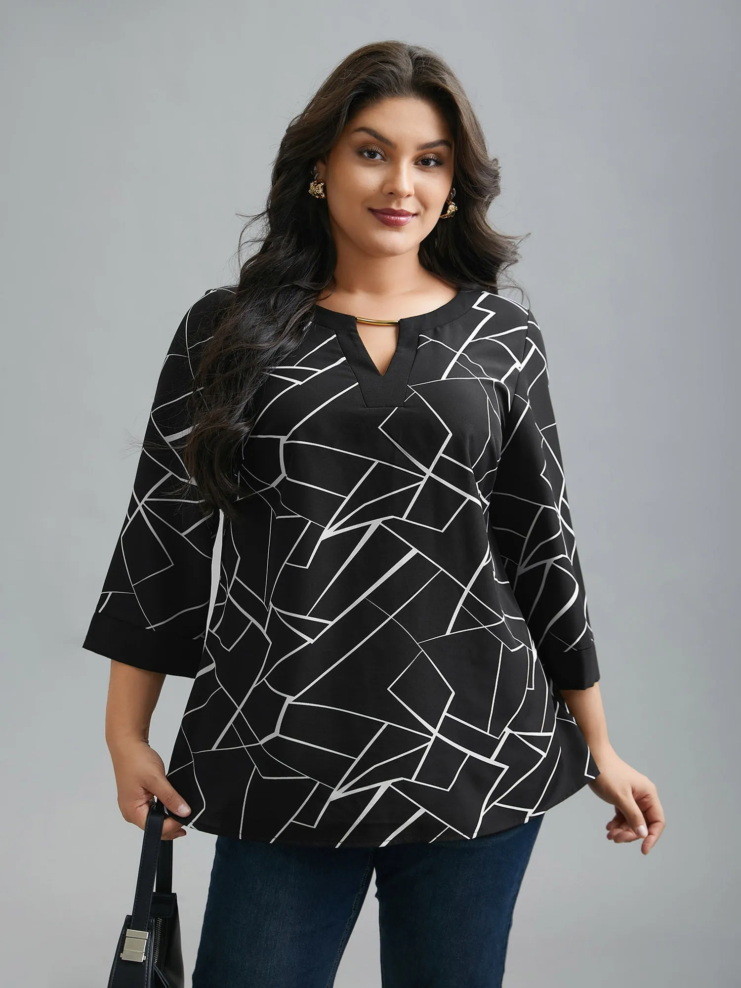 Geometric Print Metal Detail Spliced Blouse sold by Bloomchic
