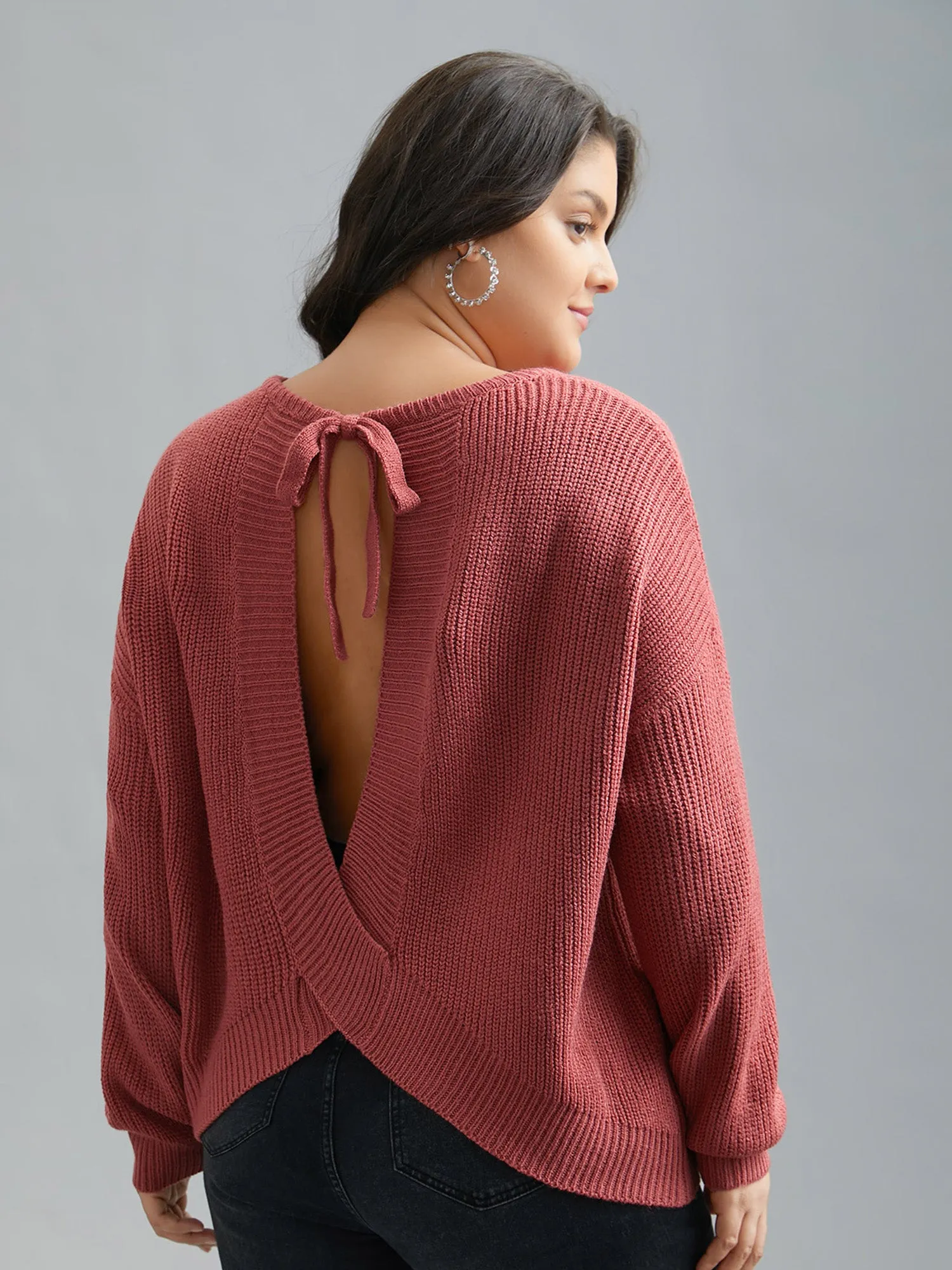 Open Wrap Back Textured Tied Pullover sold by Bloomchic