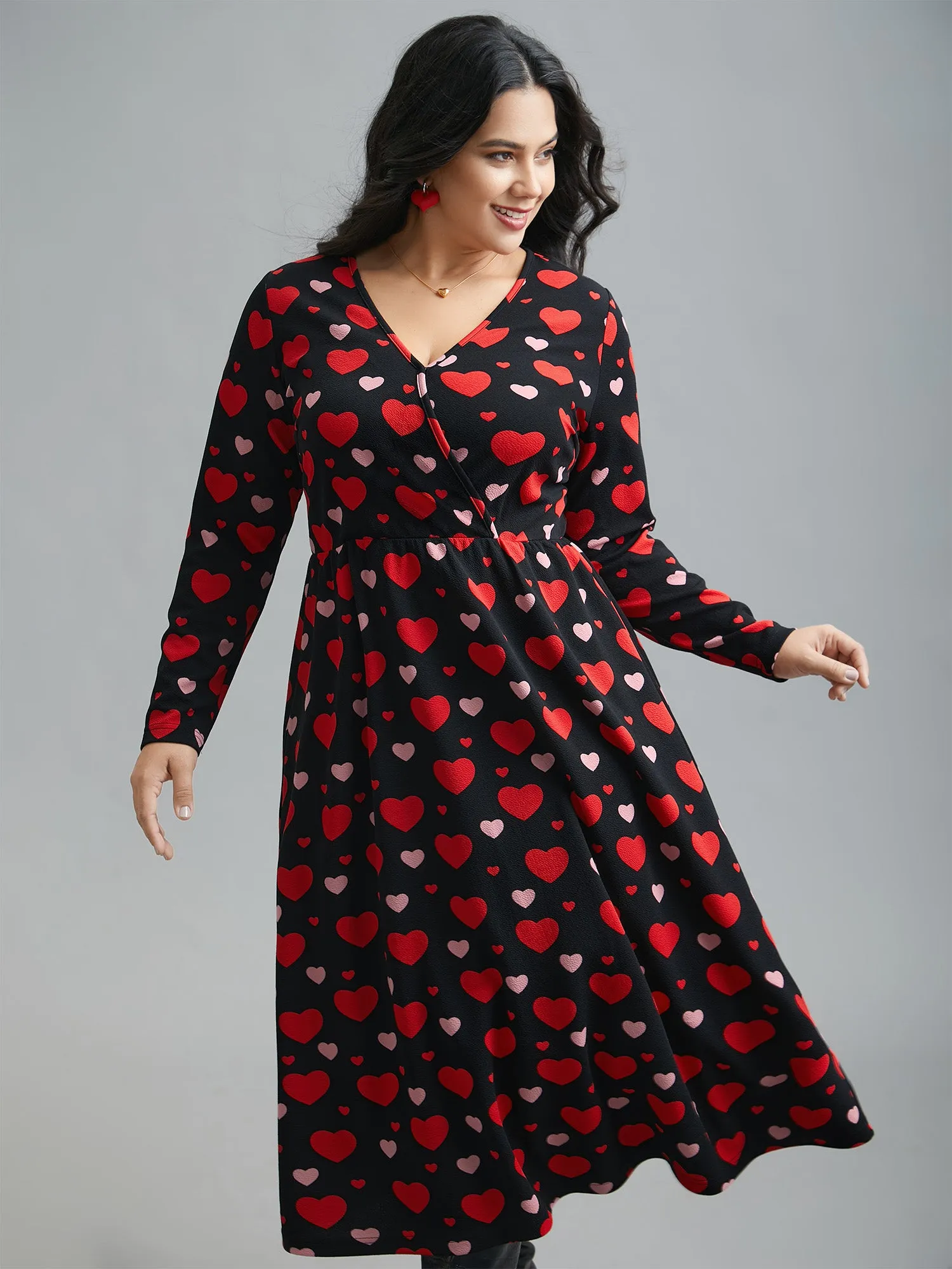 Wrap Neck Hearts Print Knit Dress sold by Bloomchic