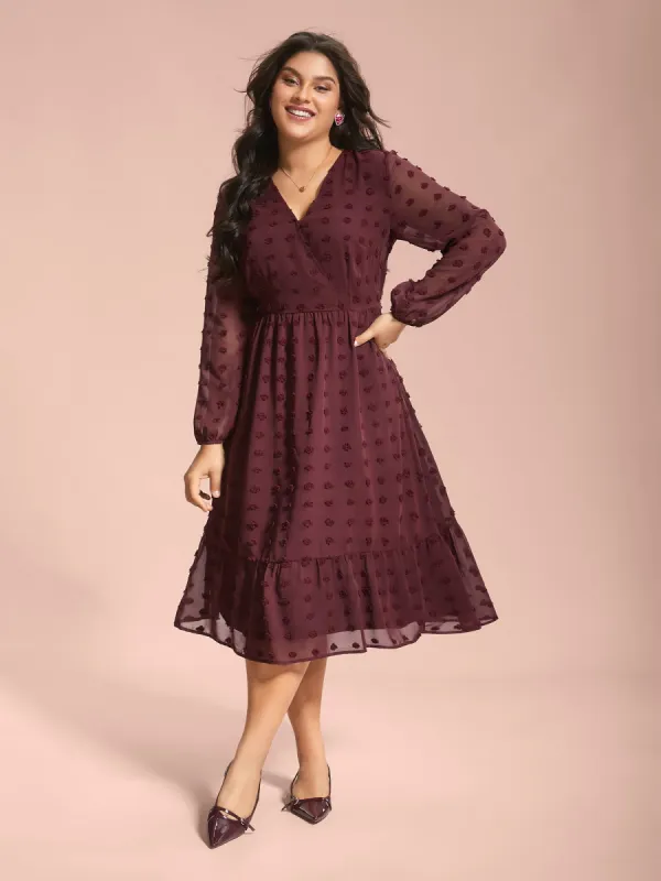 Surplice Neck Textured Tiered Dress sold by Bloomchic