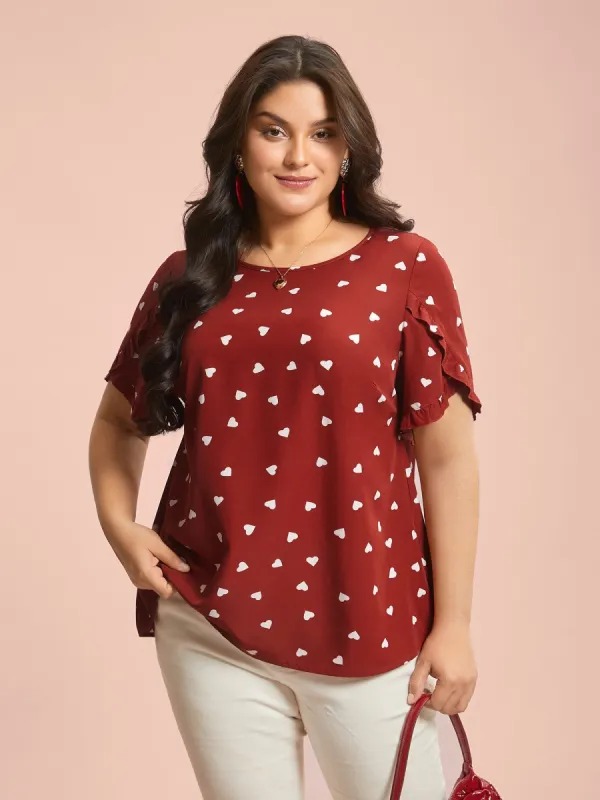 Ruffled Overlap Sleeve Heart Pattern Blouse sold by Bloomchic