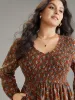 Ditsy Floral Shirred Flutter Layered Hem Dress sold by Bloomchic