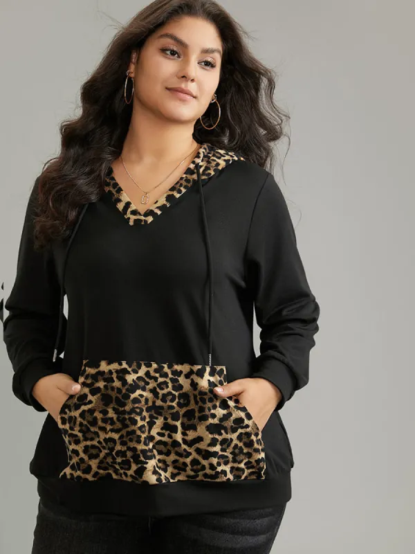 Leopard Patchwork Kangaroo Pocket Hooded Sweatshirt sold by Bloomchic