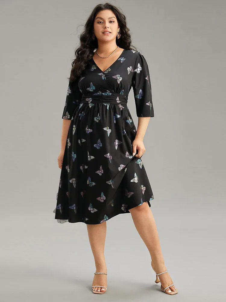 Butterfly Glitter V Neck Ruched Dress sold by Bloomchic