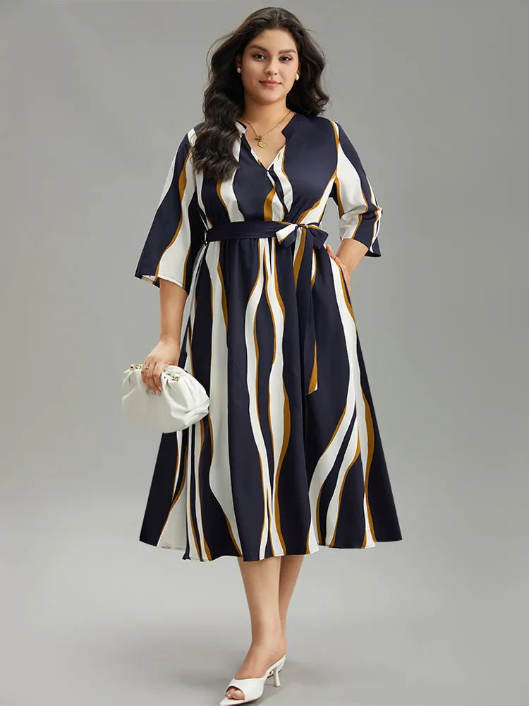 Water Ripple Belted Overlap Collar Pocket Dress sold by Bloomchic
