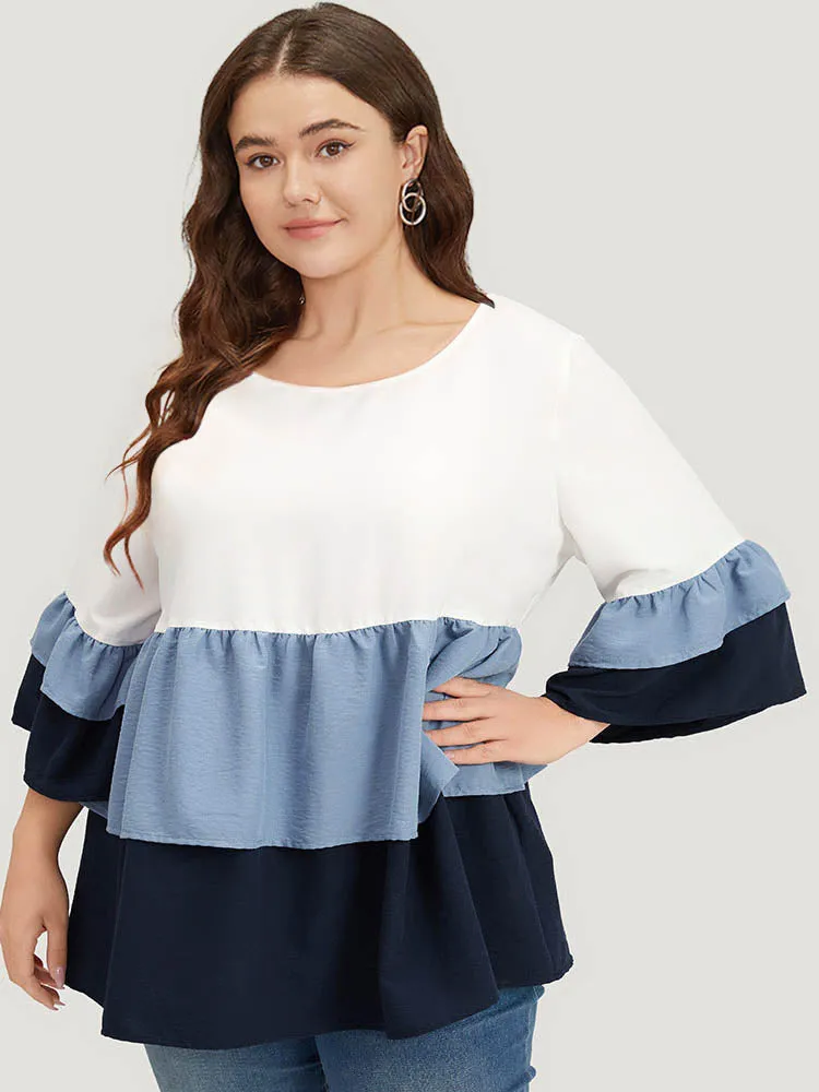 Colorblock Contrast Crew Neck Ruffle Layered Hem Blouse sold by Bloomchic