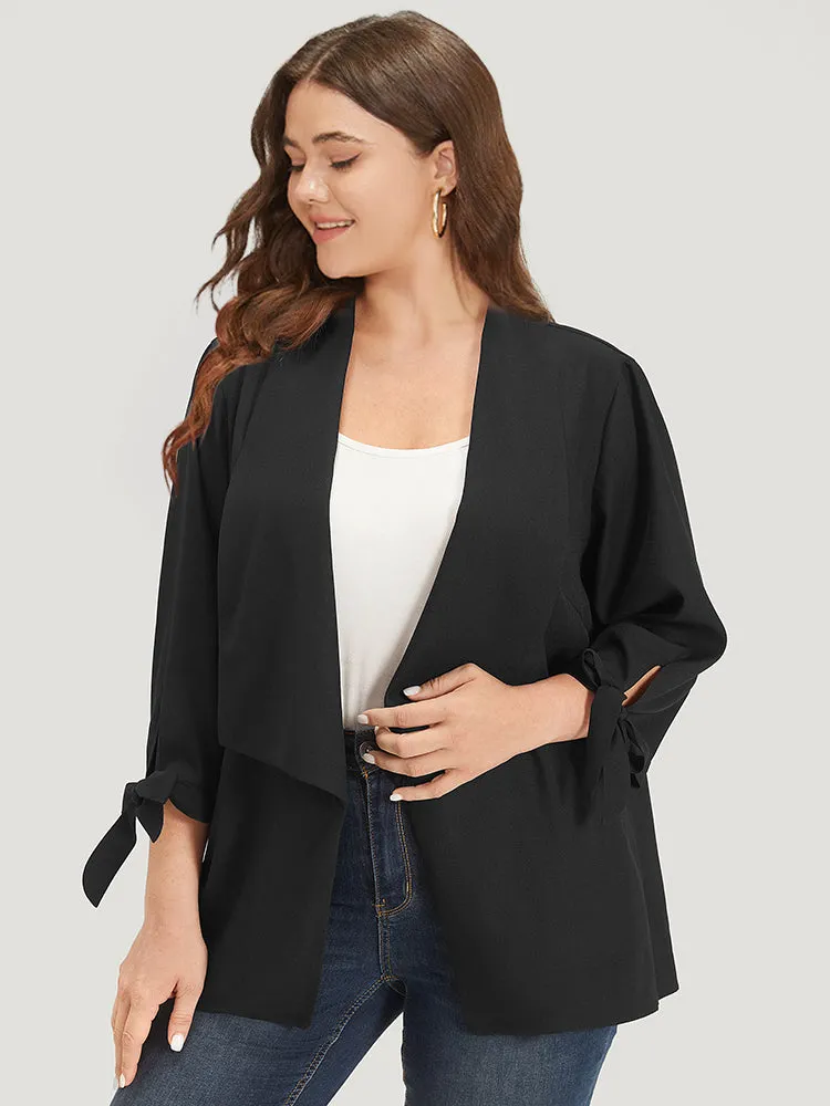 Solid Twist Sleeve Asymmetrical Hem Blazer sold by Bloomchic