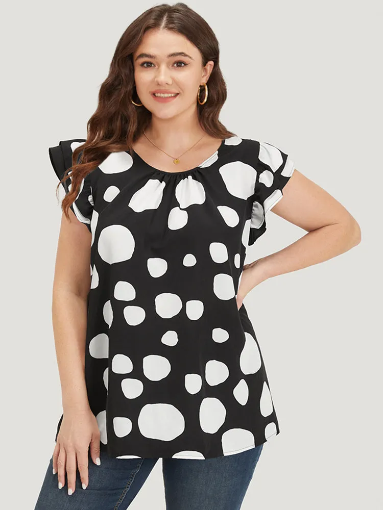 Polka Dot Flutter Cap Sleeve Tiered Blouse sold by Bloomchic