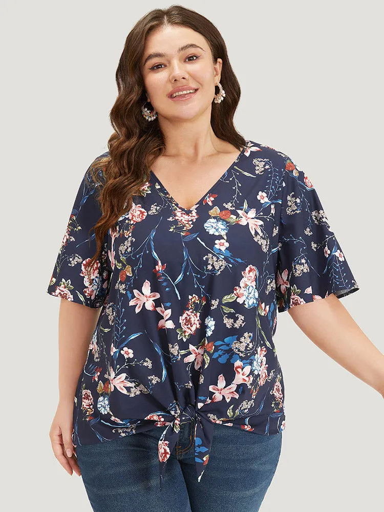 Floral Print V Neck Ruffle Sleeve Twist Hem Blouse sold by Bloomchic