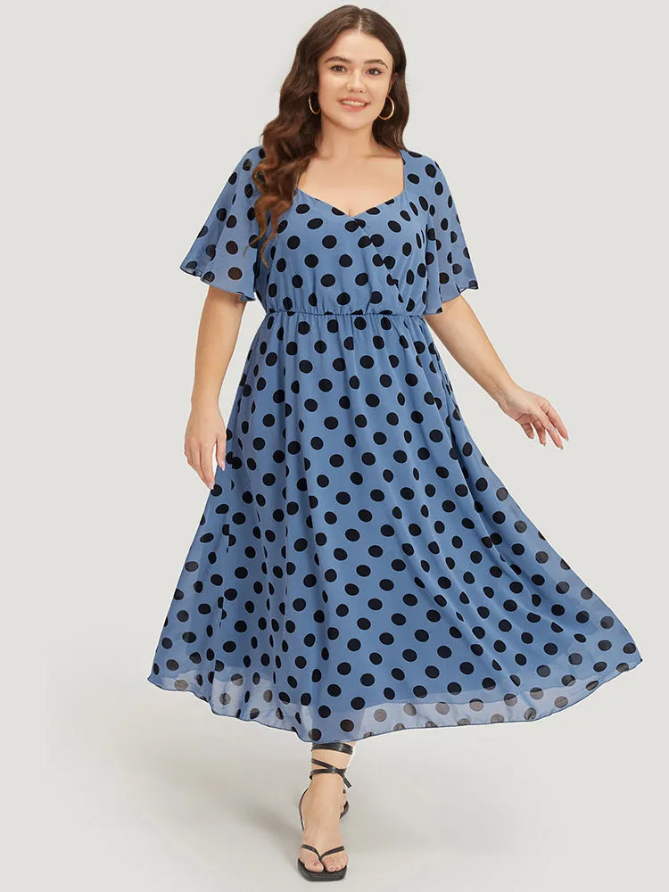 Polka Dot Two Tone Pocket Surplice Neck Dress sold by Bloomchic