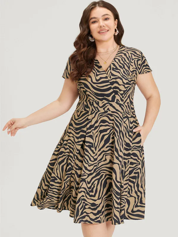 Zebra Print Pocket V Neck Ruffle Hem Dress sold by Bloomchic