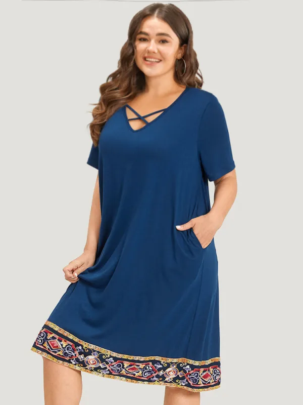 Supersoft Essentials Embroidered Patchwork Pocket Crisscross Neck Dress sold by Bloomchic