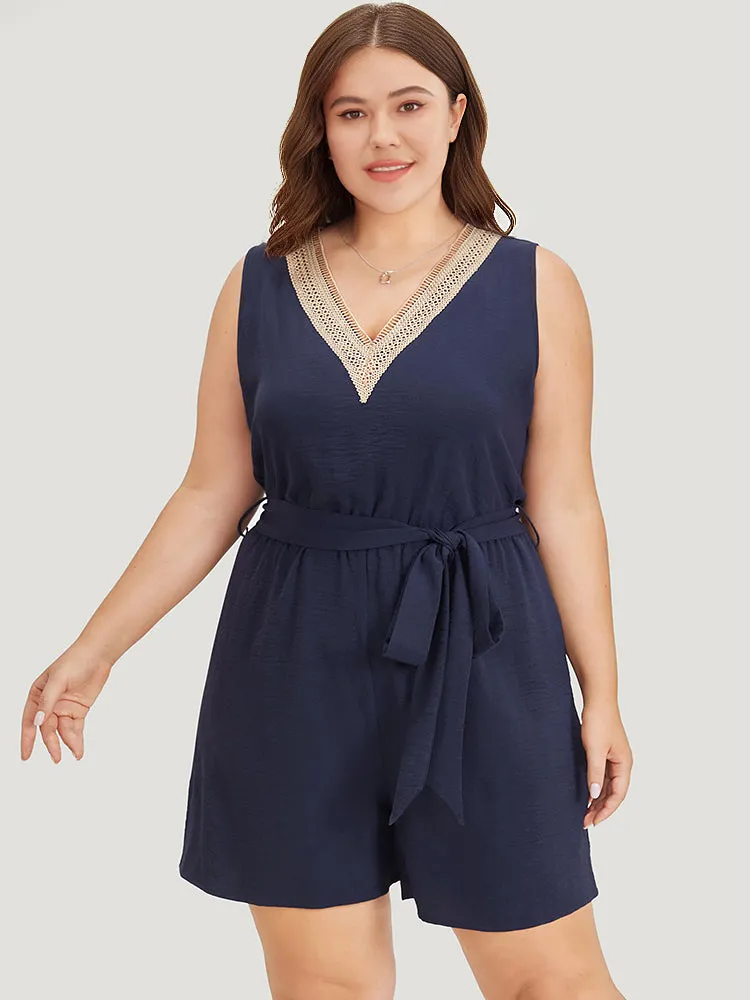 Solid Pocket Contrast Lace Belted Tank Romper sold by Bloomchic