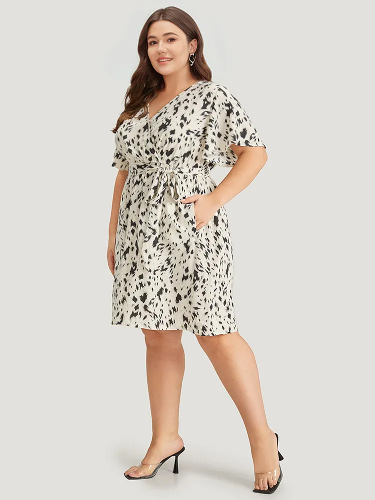 Leopard Print Belted Wrap Pocket Ruffle Sleeve Dress sold by Bloomchic product image thumbnail 2