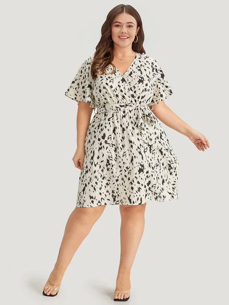 Leopard Print Belted Wrap Pocket Ruffle Sleeve Dress sold by Bloomchic