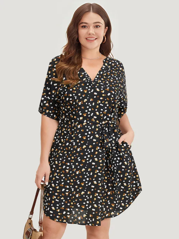 Allover Print Pocket Notched Belted Curved Hem Dress sold by Bloomchic