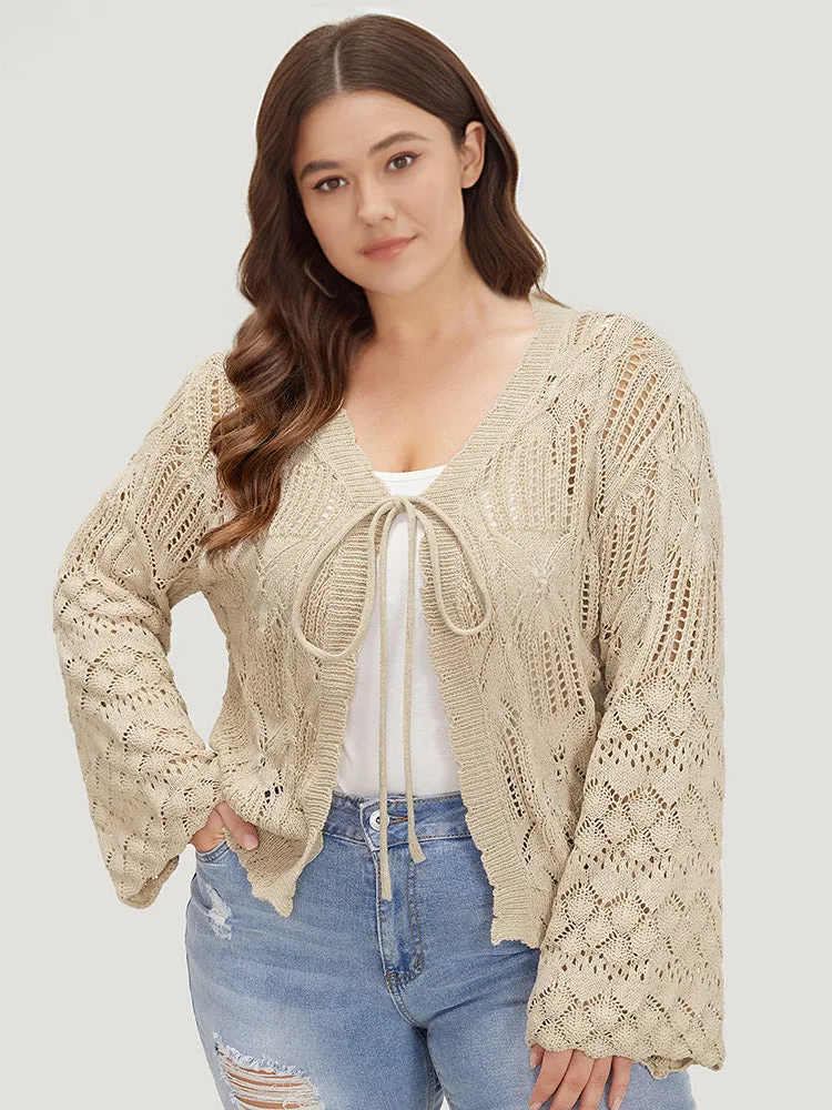 Hollow Out Bell Sleeve Tie Front Cardigan sold by Bloomchic