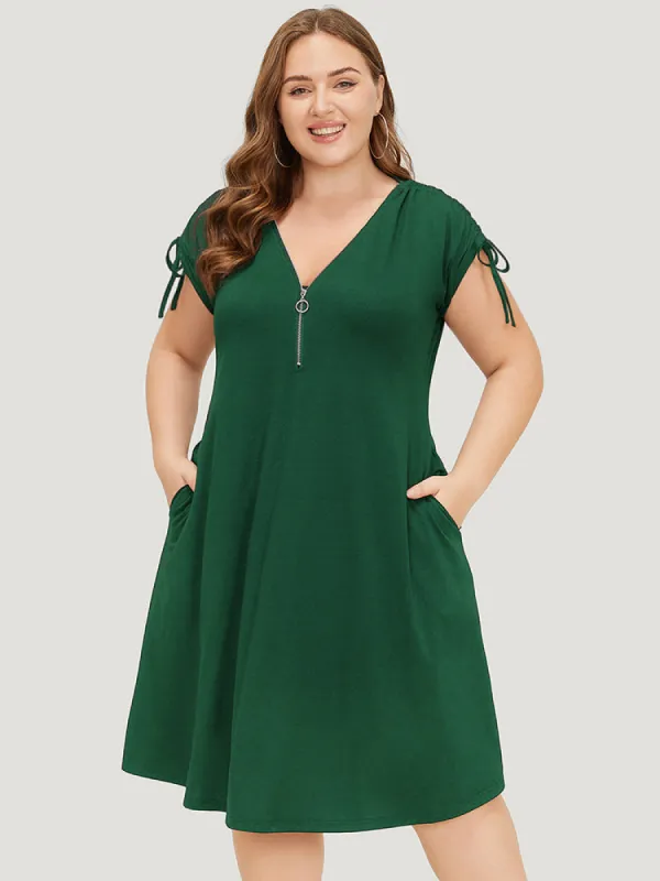 Solid Drawstring Sleeve Pocket Ruffle Zip Up Dress sold by Bloomchic