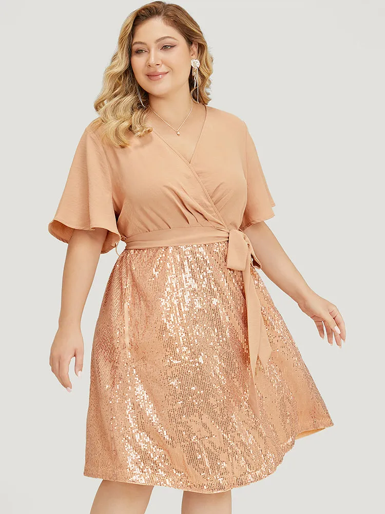Sequin Patchwork Pocket Belted Surplice Neck Ruffle Dress sold by Bloomchic