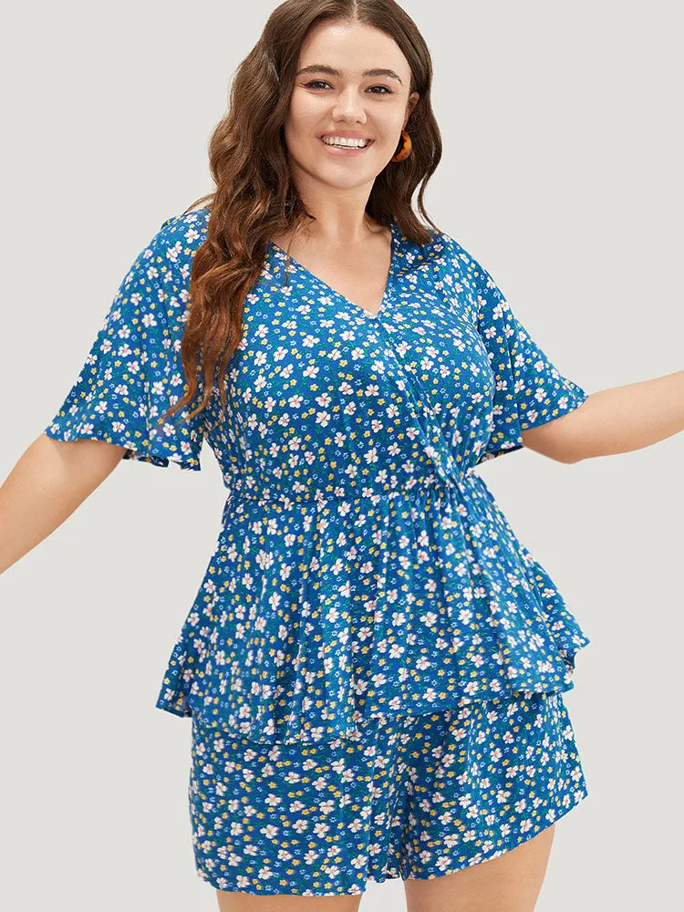 Ditsy Floral Tiered Hem Ruffle Sleeve Pocket Wrap Romper sold by Bloomchic