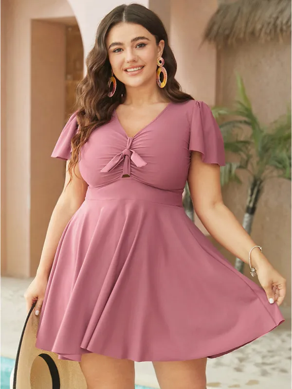 Ruffle Sleeve Knotted Front Ruched Swim Dress sold by Bloomchic
