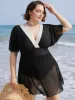 Contrast Lace Knot Back Mesh Ruffle Swim Dress sold by Bloomchic