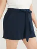 Solid Belted Pocket Ruffle Trim Shorts sold by Bloomchic