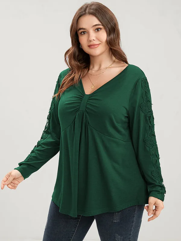Solid V Neck Ruched Embroidered Arc Hem Long Tee sold by Bloomchic