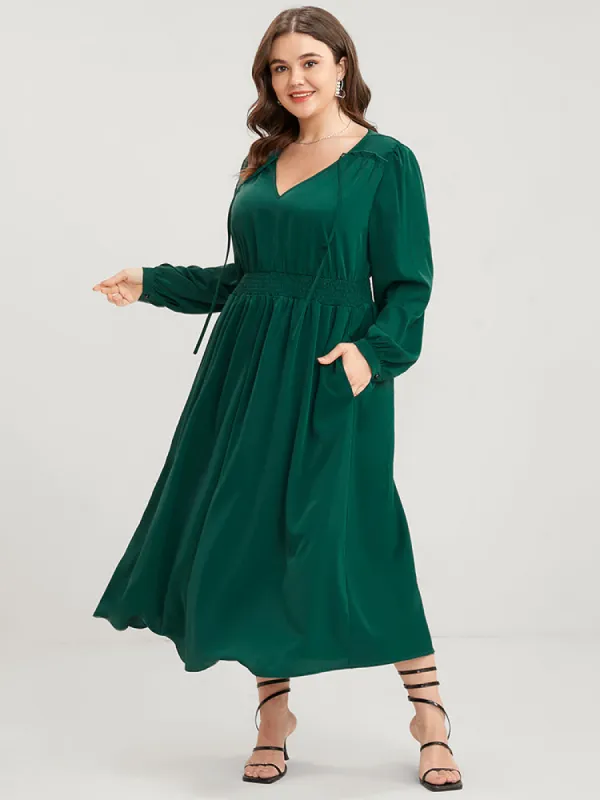 Solid Pocket Shirred Tie V Neck Ruffle Hem Dress sold by Bloomchic