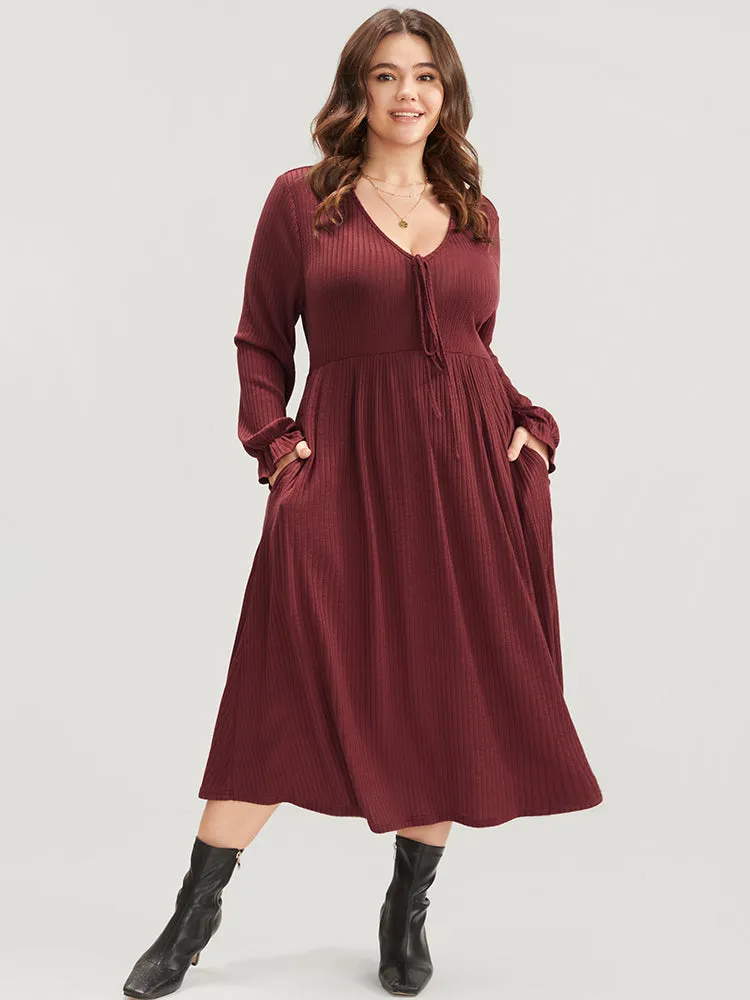 Solid Lantern Sleeve Tie Neck Pocket Rib Knit Dress sold by Bloomchic product image thumbnail 2
