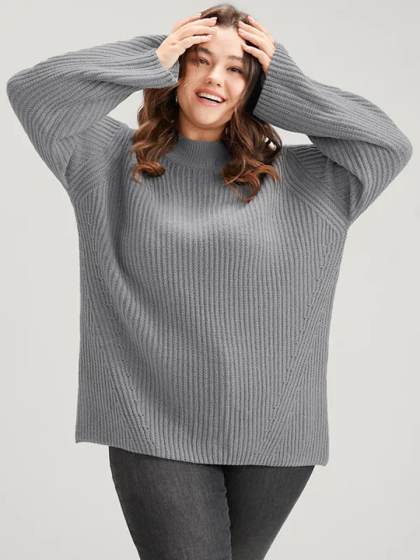Solid Pointelle Knit Mock Neck Bell Sleeve Split Knit Top sold by Bloomchic