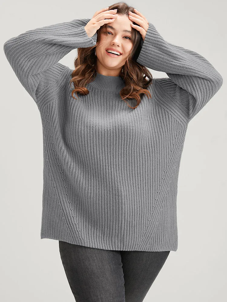 Solid Pointelle Knit Mock Neck Bell Sleeve Split Knit Top sold by Bloomchic