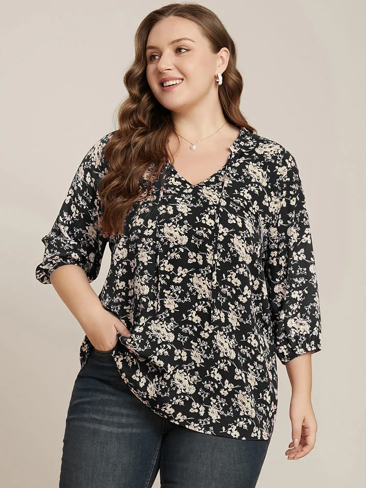Floral Print Lantern Sleeve Tie V Neck Blouse sold by Bloomchic