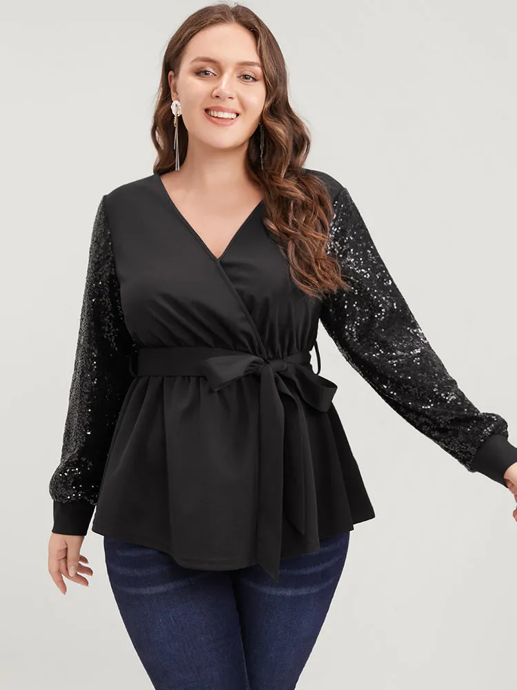 Solid Sequin Belted Surplice Neck Blouse sold by Bloomchic