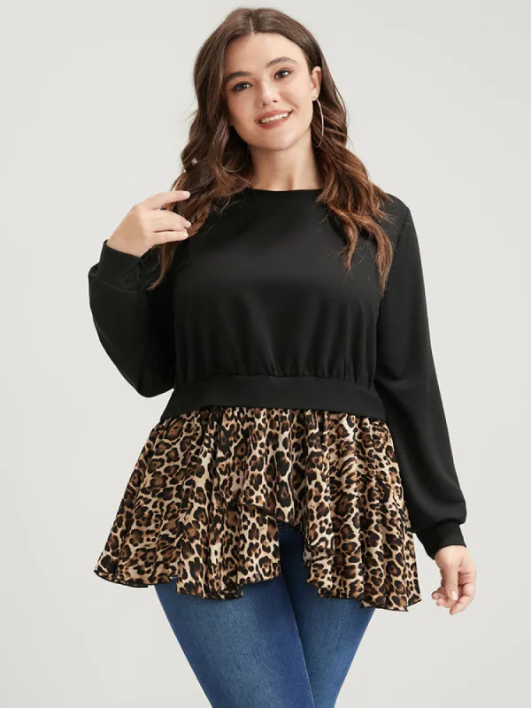 Leopard Patchwork Asymmetrical Hem Sweatshirt sold by Bloomchic