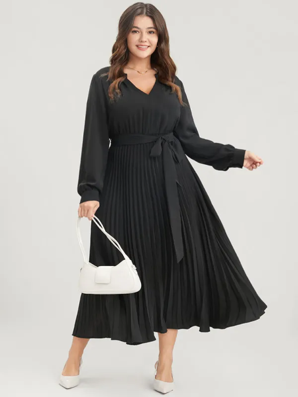 Solid V Neck Belted Pleated Midi Dress sold by Bloomchic